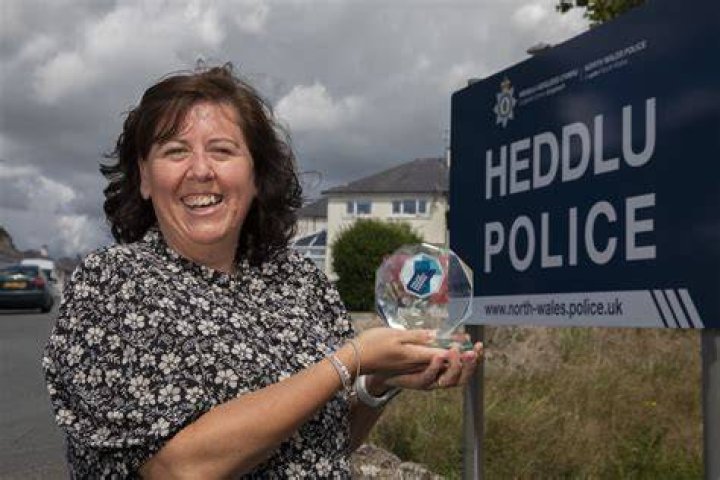 
48, Clare Larkey Jones received an award after stopping a gang from assaulting a man 