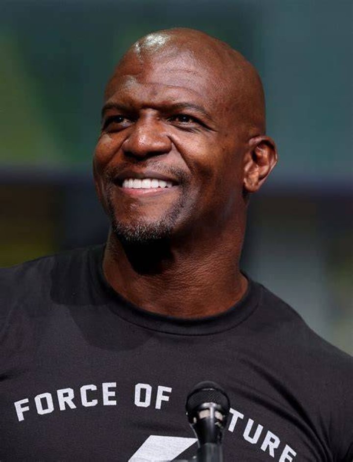 Fans have faith in Apollo Crews. Terry Crews, an American actor, is related to an American wrestler.